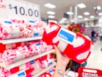 hand holding a plush valentine's day throw blanket at target