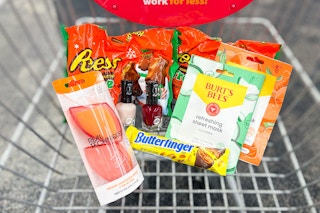 reeses trees, sally hansen nail polish, burts bees sheet masks, butterfinger, and real techniques makeup sponge in a cart