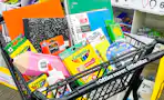 school supplies in an office depot shopping cart
