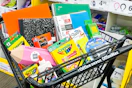 school supplies in an office depot shopping cart