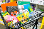 school supplies in an office depot shopping cart