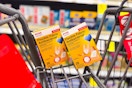 2 boxes of cvs health bandages in a cart