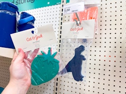 hand holding a cat & jack ice pack in front of a target shelf