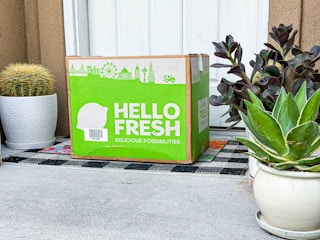 HelloFresh meal kit box outside a door