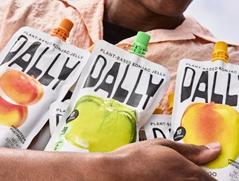 a person holding three konjac jelly puches
