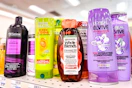 tresemme, garnier, and loreal shampoos on a shelf