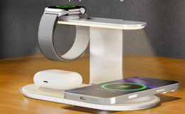 an iPhone, watch, and AirPods on a charging stataion