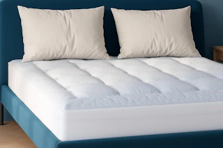a cooling mattress protector on a bed