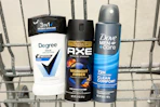 degree, axe and dove deodorant in a shopping cart
