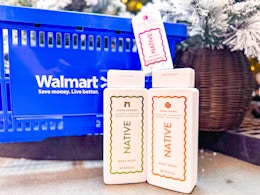 Native body wash and deodorant in front of a Walmart basket