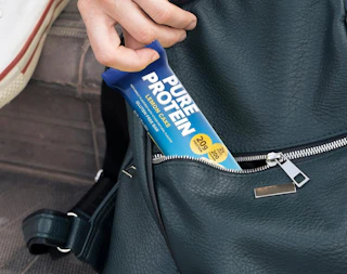 a protein bar in backpack