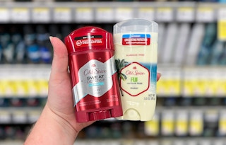 hand holding old spice deodorants