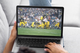 College football game streaming on a MacBook