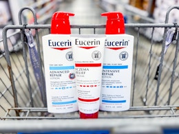 three bottles of lotion in a shopping cart