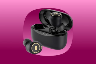A pair of Monster bluetooth earbuds and a charging case in black with gold trim
