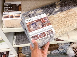 maples rugs on shelves