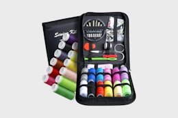 sewing kit on a grey background