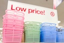 Three colors (pink, green & blue) Brighroom jelly baskets in Target store on shelf with "Low price!" sign in background