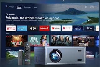 a projector in front of a screen