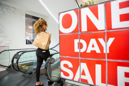 macys one day sale sign with a model