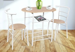 white metal and natural wood colored dining set