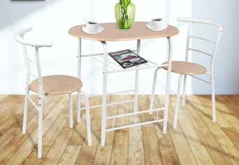 white metal and natural wood colored dining set