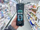 hand holding axe body wash in walgreens