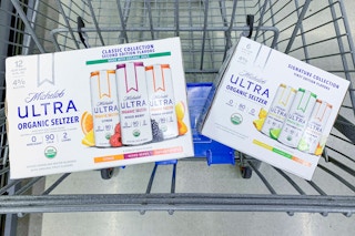 two boxes of michelob ultra seltzer in walmart cart