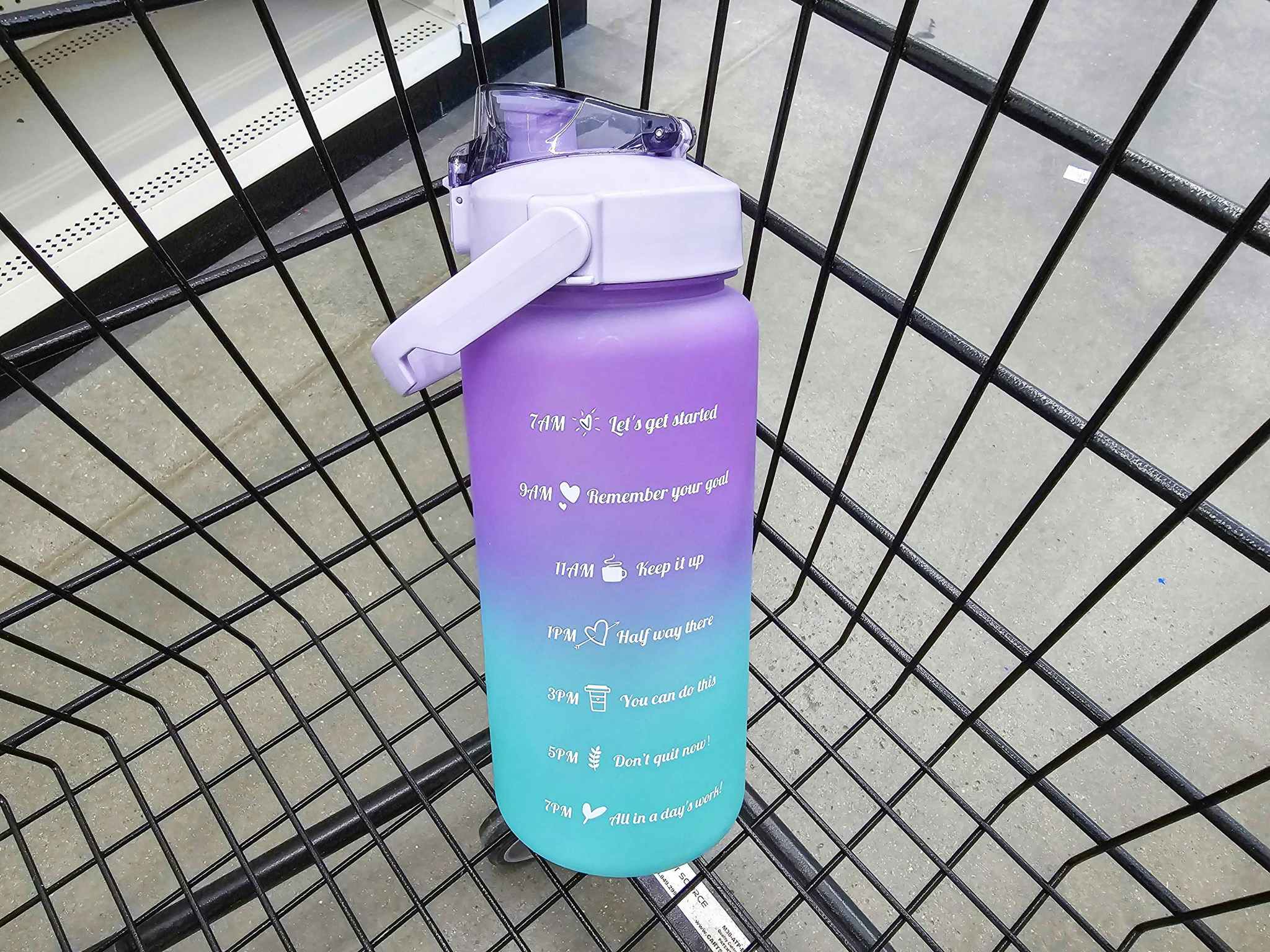 motivational water bottle in a cart