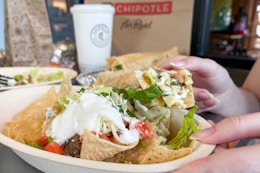 a person with a chipotle entree at a table