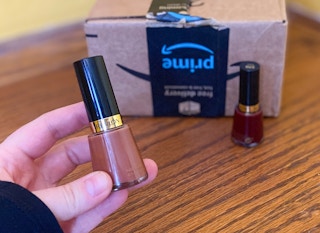 amazon box hand holding revlon nail polish em 202298 1651089378 1651089378