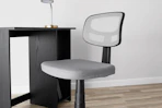 gray task chair at a desk