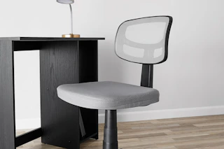 gray task chair at a desk