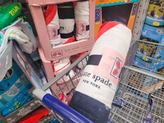 Kate Spade oversized beach towel in a cart