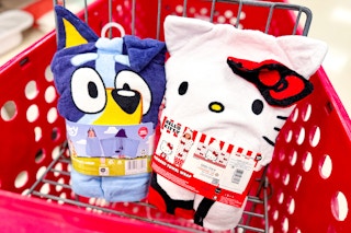 kids' character hooded bath towels sitting in a target cart