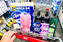 charmin toilet paper, gillette venus razors, crest toothpaste, tresemme shampoo, and irish spring body wash in a cart