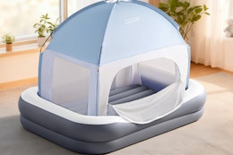air mattress tent in the middle of a room
