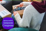 a woman opening up an amazon box