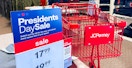 A JCPenney presidents day sale sign and cart