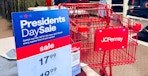 A JCPenney presidents day sale sign and cart