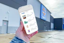 hand holding a smartphone displaying 1-clip coupons in the kcl app