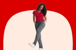 Stock image of a woman wearing a pair of Hanes french terry pants in grey