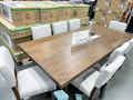 dining set with upholstered chairs on display in costco