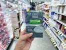 hand holding dove bar soap pack in walgreens