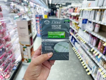 hand holding dove bar soap pack in walgreens