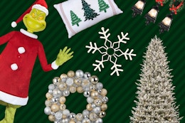 animatronic Grinch, holiday throw pillow, light up snowflake, ornament wreath Christmas tree, and outdoor light