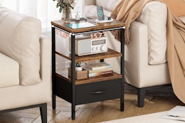 nightstand with a charging station next to furniture