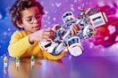 Lifestyle image of child playing with the Lego City Space Station