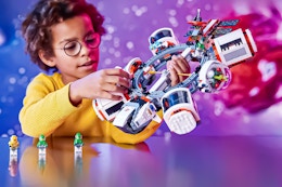 Lifestyle image of child playing with the Lego City Space Station