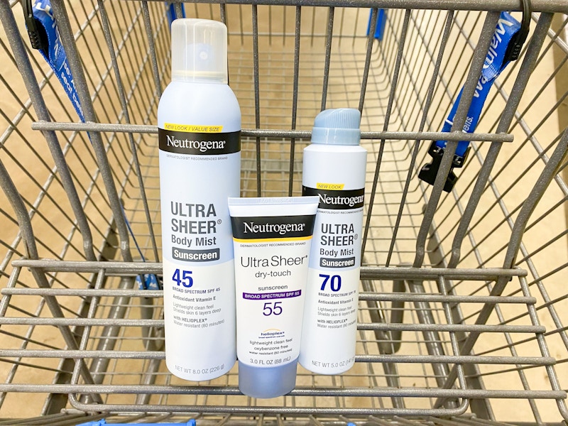 three bottles of neutrogena sunscreen in walmart cart